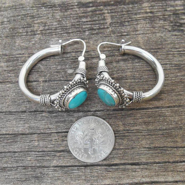 Pendientes vintage de turquesa de Vega Madrid, diseño clásico con detalles en plata y piedras turquesa.