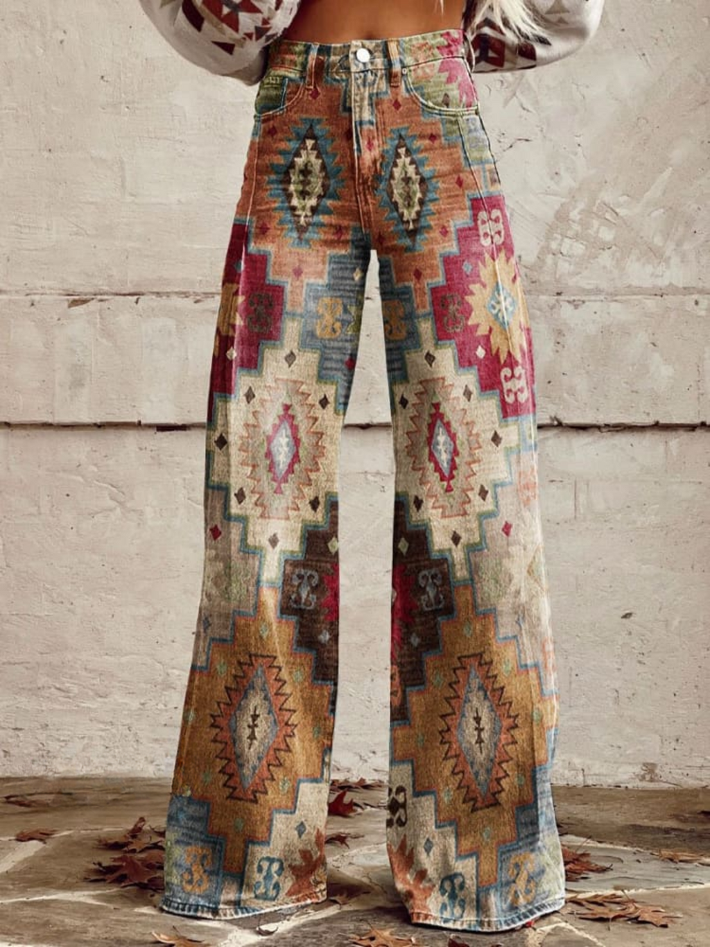 Pantalón palazzo boho Dakota de Vega Madrid, con estampado floral y cintura elástica, en tonos neutros.