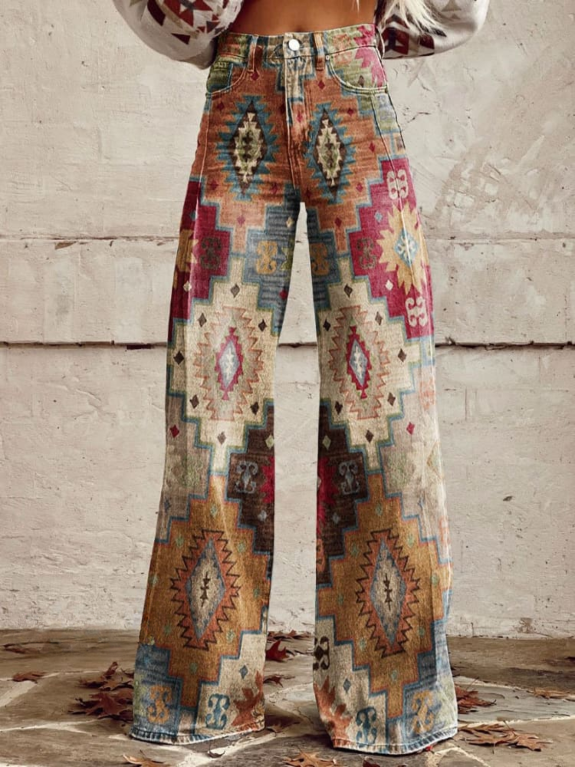 Pantalón palazzo boho Dakota de Vega Madrid, con estampado floral y cintura elástica, en tonos neutros.