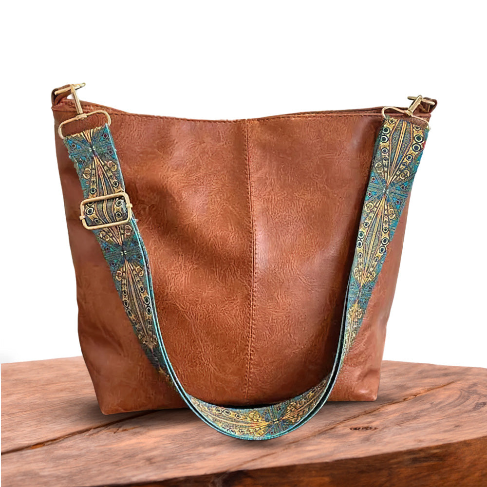 Bolso tote de piel Sofía de Vega Madrid, en color marrón, con asas robustas y diseño elegante para uso diario.