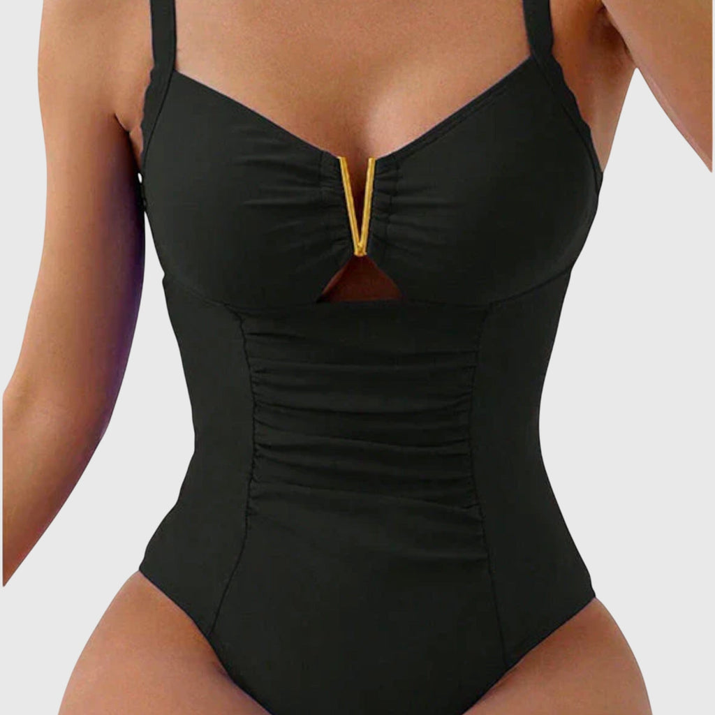 Bañador con escote en V de Vega Madrid, Cincia, en color negro, con diseño ajustado y tirantes finos para mujer.