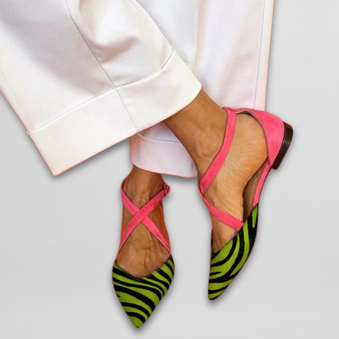 Bailarina Fern Cebra Rosa de Vega Madrid, zapato plano con diseño de rayas rosas y negras, ideal para estilo casual y cómodo.