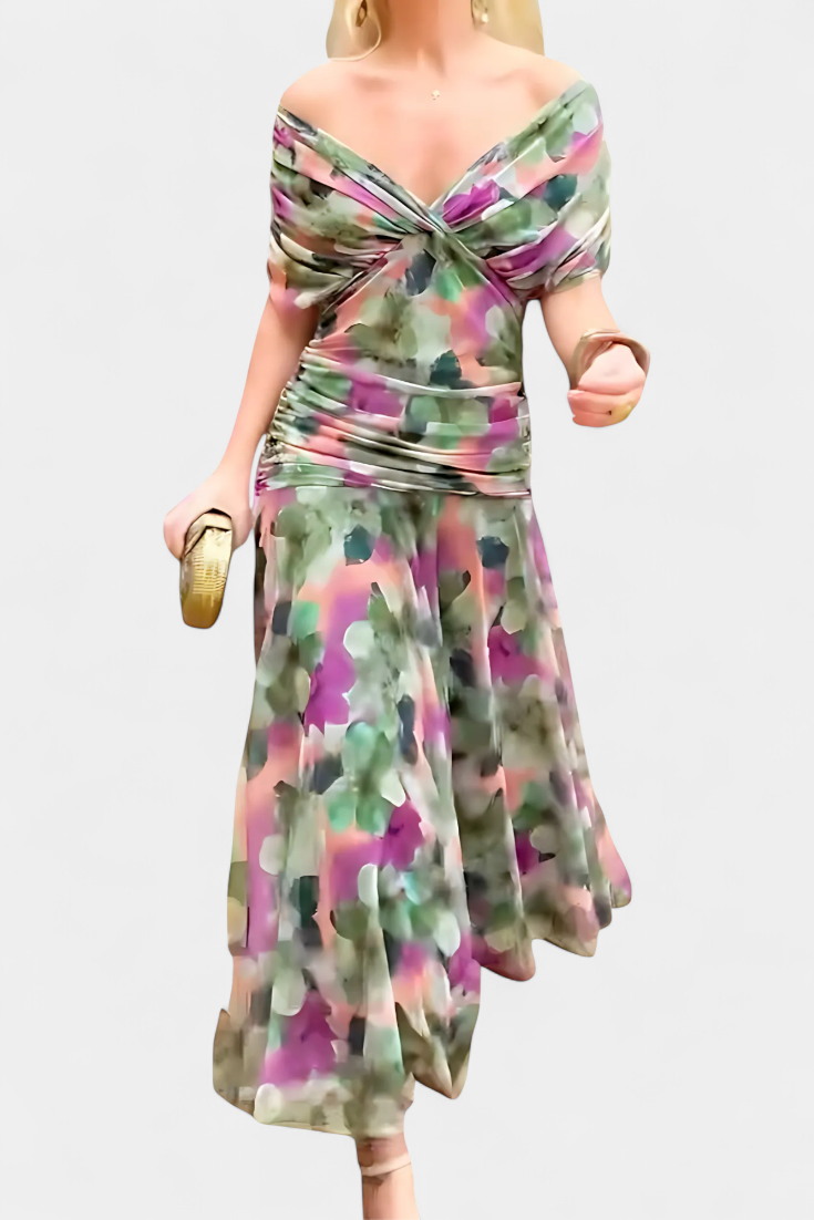 Vestido largo Celeste de Vega Madrid con escote cruzado y tejido fluido, mostrando su diseño elegante y cómodo.