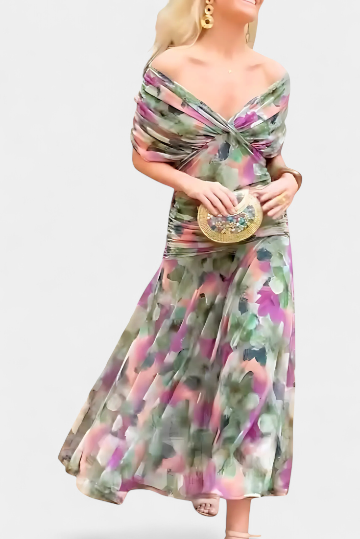 Vestido largo Celeste de Vega Madrid con escote cruzado y tejido fluido, mostrando su diseño elegante y cómodo.