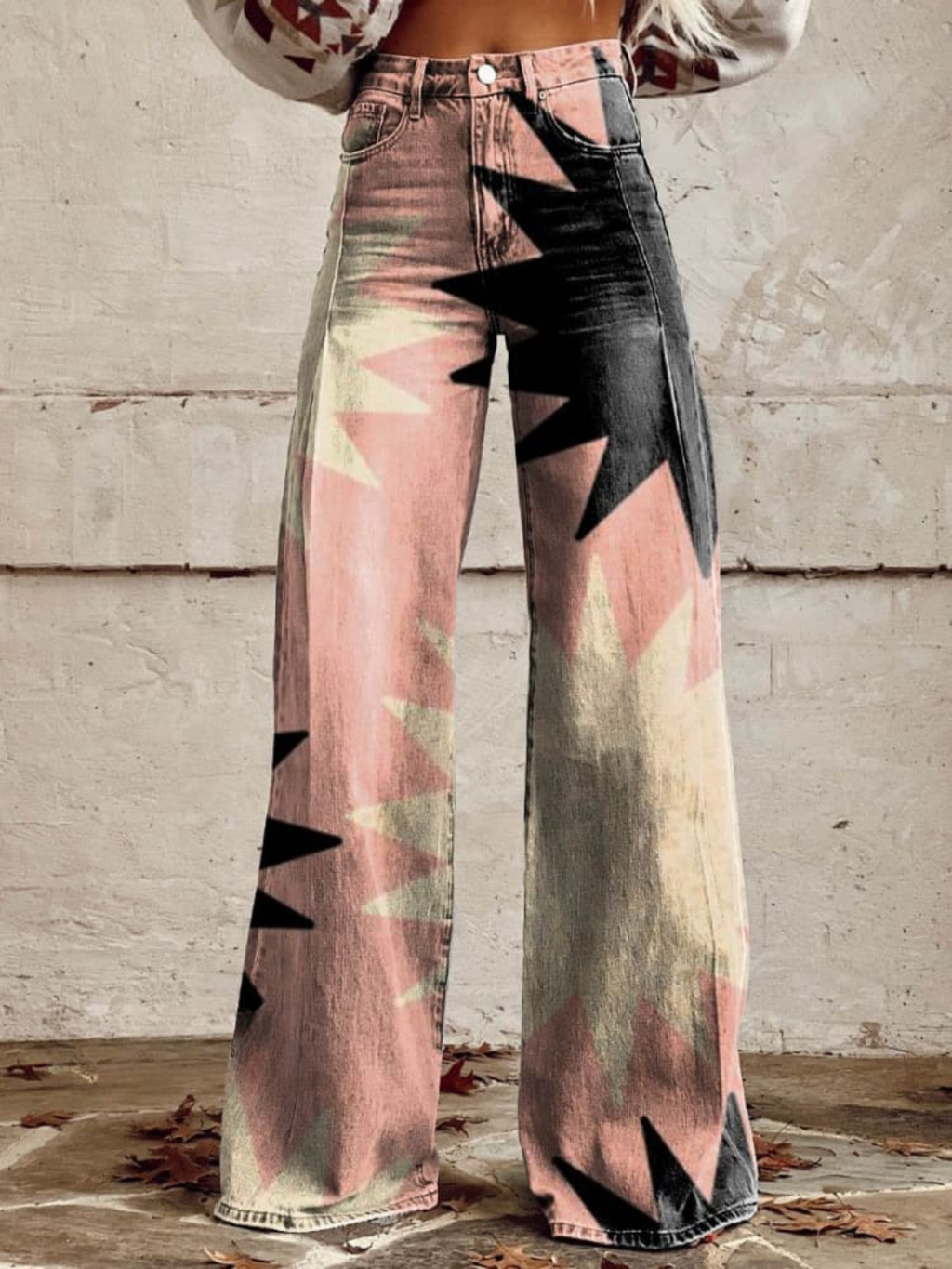 Pantalón bohemio elegante Iris de Vega Madrid en tela fluida con estampados florales y corte suelto.