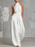 Mono sin mangas y cuello halter Fabiola de Vega Madrid, elegante y moderno, en color negro con diseño ajustado.