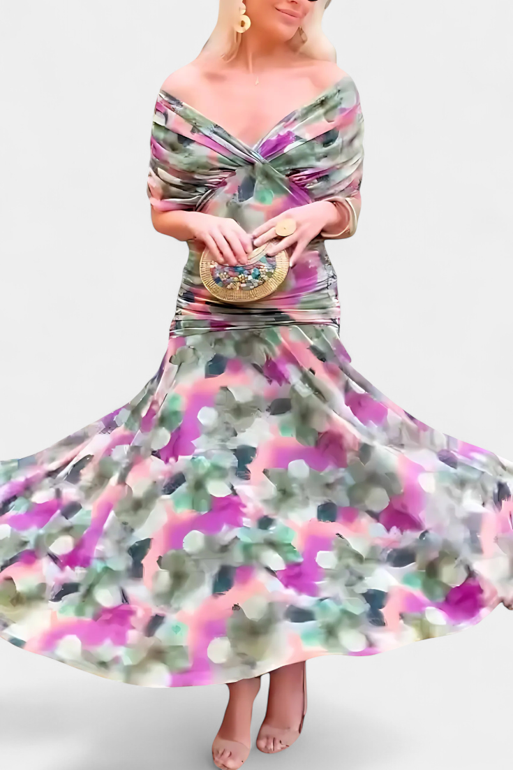 Vestido largo Celeste de Vega Madrid con escote cruzado y tejido fluido, mostrando su diseño elegante y femenino.