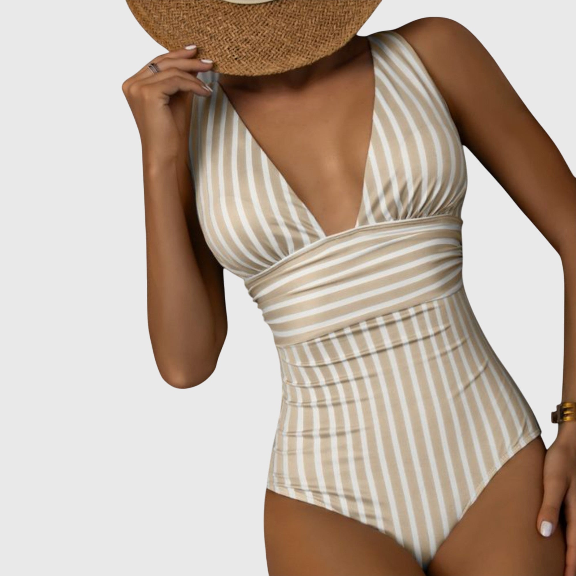 Bañador con rayas Aurora de Vega Madrid, traje de baño femenino con diseño a rayas en colores vibrantes para playa o piscina.