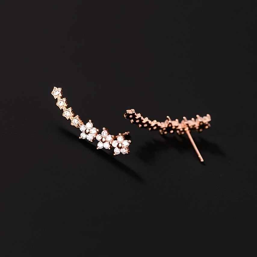 Pendientes florales elegantes de Vega Madrid con diseño delicado y detalles en tonos suaves, ideales para ocasiones especiales.
