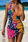Tankini floral de Vega Madrid con short y efecto vientre plano, ideal para la playa, en colores vibrantes y diseño cómodo.
