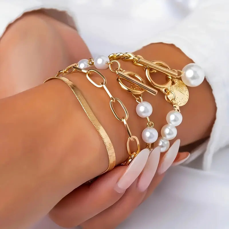 Set de Pulseras Chic Doradas (4 Piezas) – Serpiente, Perlas y Eslabones