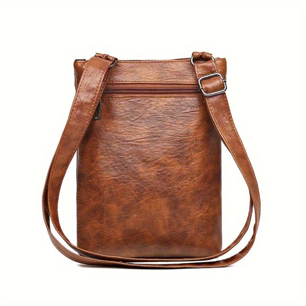 Bolso bandolera de piel Danielle de Vega Madrid, color negro, con correa ajustable y detalles elegantes para mujer.