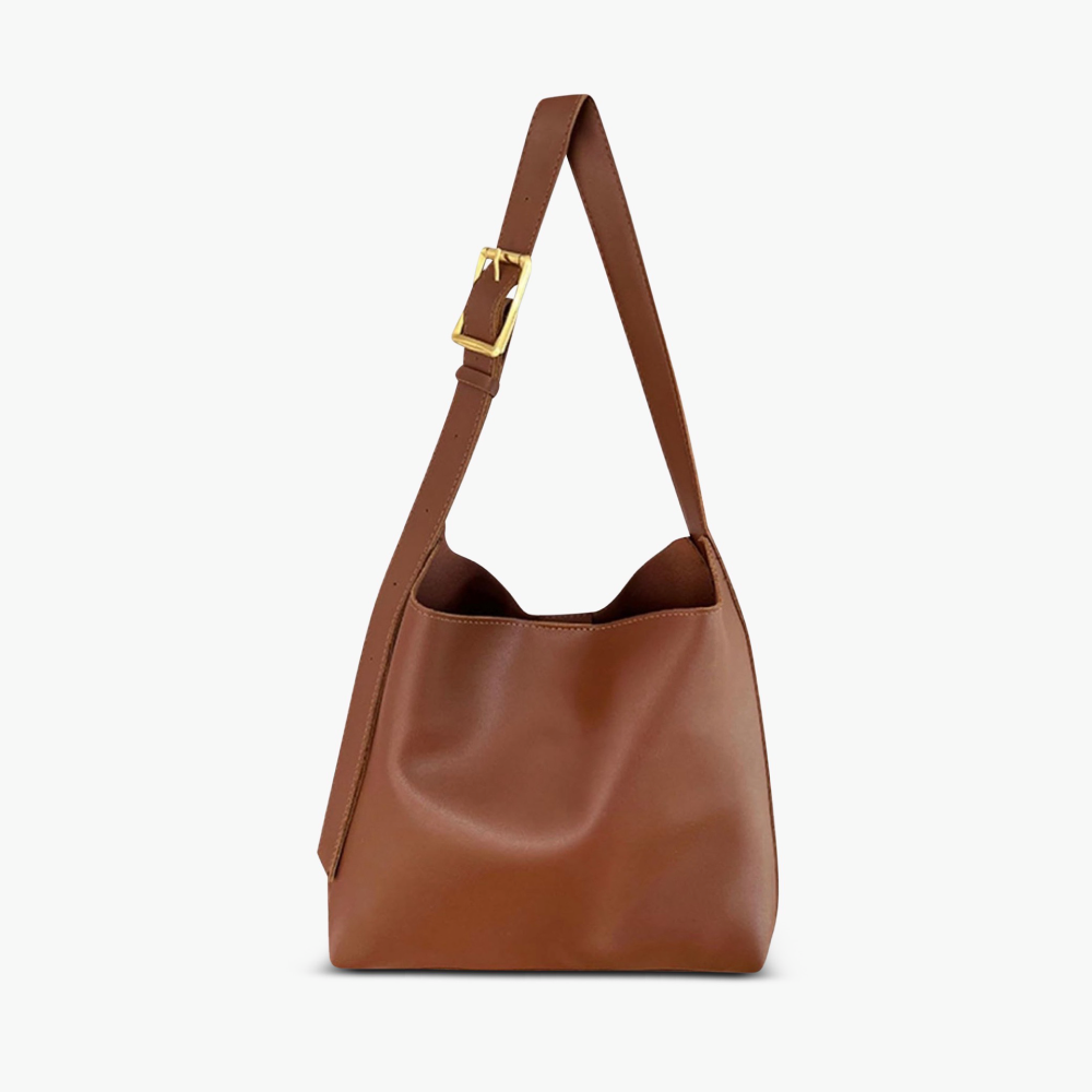Bolso de hombro de piel Ela de Vega Madrid, diseño elegante en cuero con asa ajustable y detalles sofisticados.