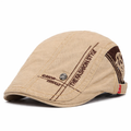 Gorra de verano beige en tela denim con bordado de estilo ivy de la marca Vega Madrid.
