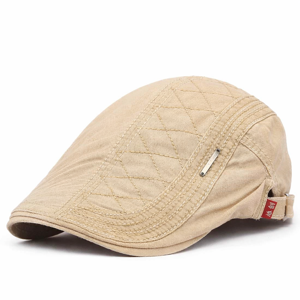 Gorra vintage beige de Vega Madrid con diseño acolchado y motivo animal, estilo clásico y elegante para hombre.