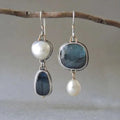 Pendientes vintage de piedra azul y perla de Vega Madrid, con diseño elegante y detalles artísticos.