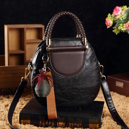 Bolso tote de piel Bianca de Vega Madrid, con asas resistentes y diseño elegante, en color marrón claro.