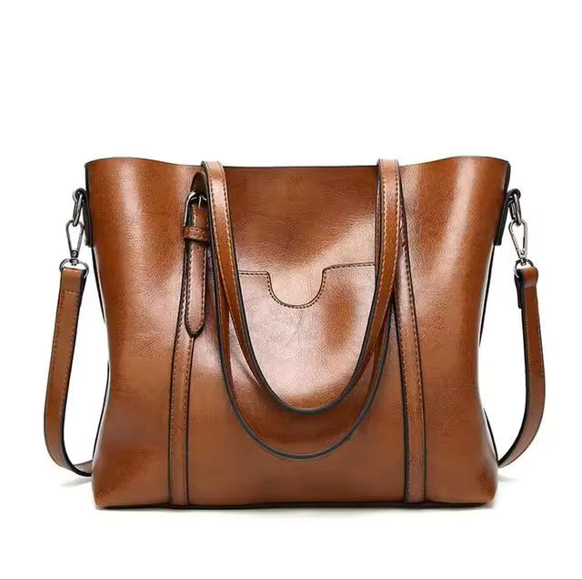 Bolso tote de piel Aubrey de Vega Madrid, con diseño elegante y detalles en cuero genuino, en color negro.