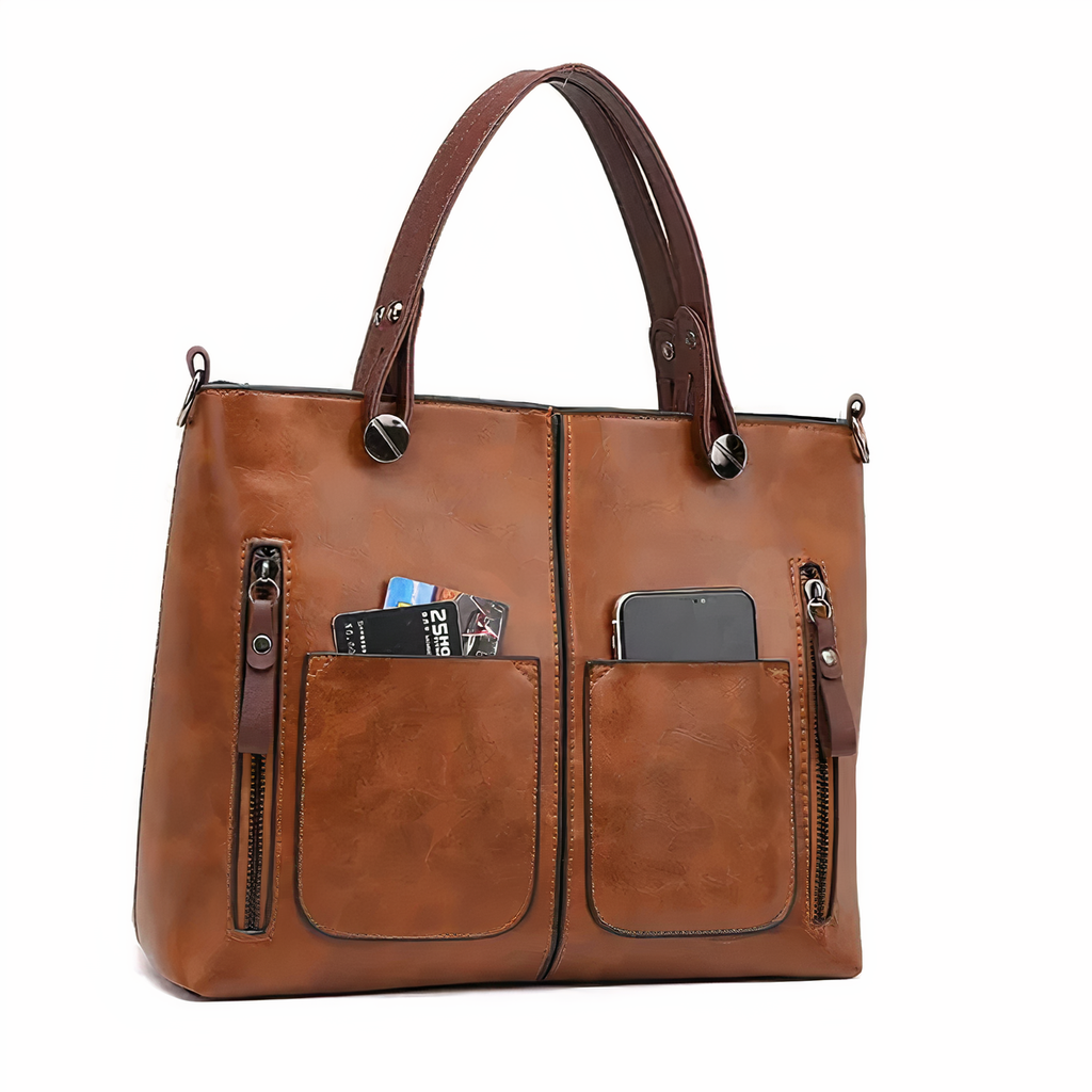 Bolso de piel Sydney de Vega Madrid, bolso versátil con asas cortas y detalles elegantes en acabado suave y de alta calidad.
