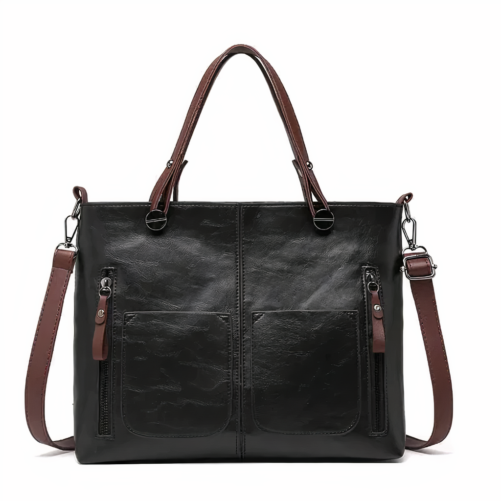 Bolso de piel Sydney de Vega Madrid, bolso versátil con asas cortas y detalles en piel suave, en color camel.
