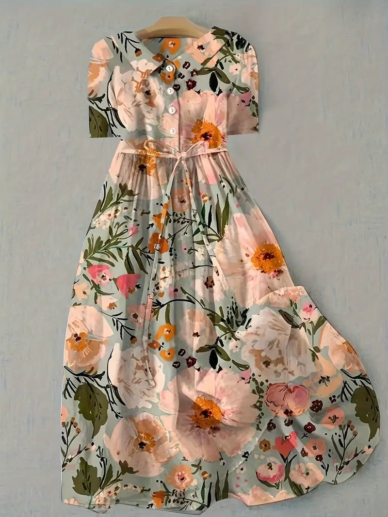 Vestido midi floral romántico de Vega Madrid, elegante y cómodo, con estampado floral para mujer.