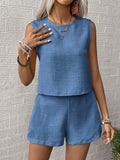 Conjunto Olga Marina de Vega Madrid, ropa elegante con top y falda en tonos marinos, diseñado para un look sofisticado.