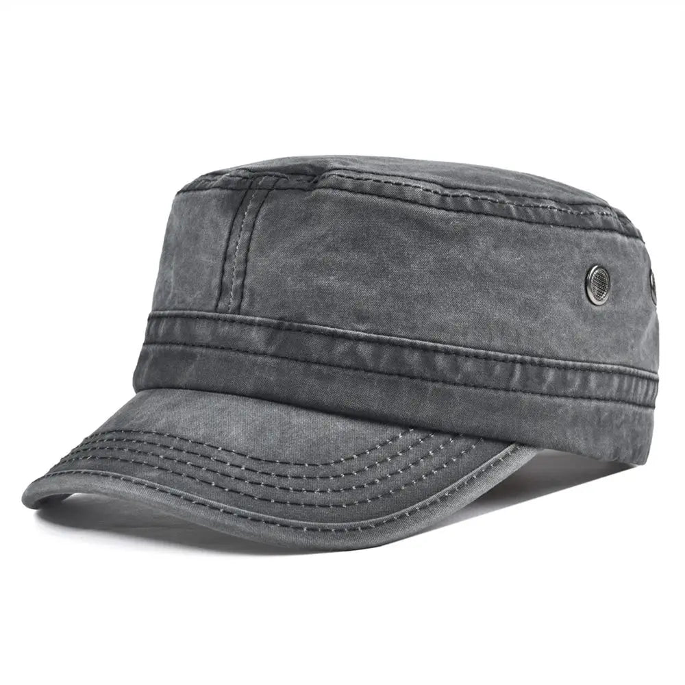 Gorra vintage resistente Diego de Vega Madrid, en color oscuro, con diseño clásico y visera curva en la imagen.