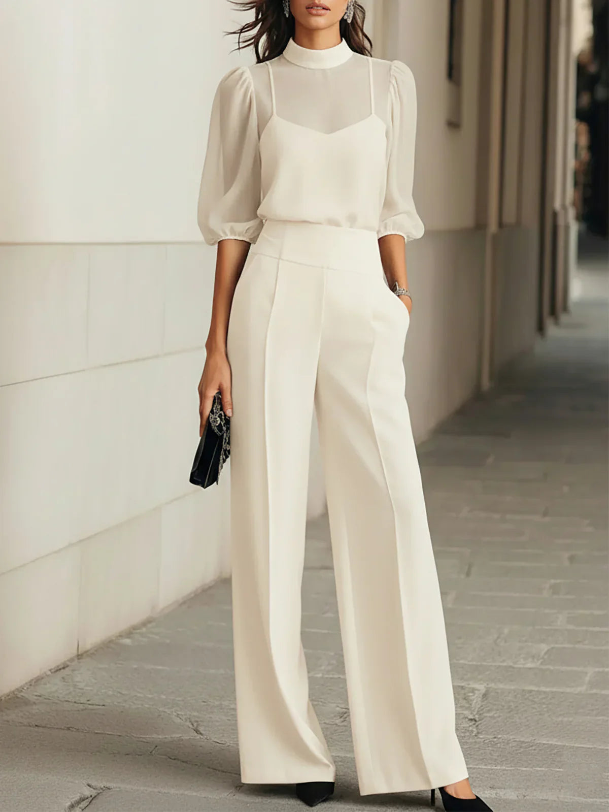 Conjunto Rita Vega Madrid de silueta fina, vestido ajustado en color negro, con detalles elegantes y ajustados.