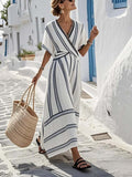 Vestido largo de diseño mediterráneo Claudia de Vega Madrid, con estampado y detalles elegantes en la imagen.