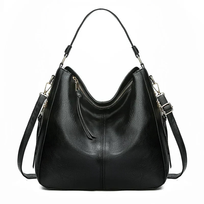 Bolso de hombro de piel Morgan de Vega Madrid, con diseño clásico y elegante en cuero natural.