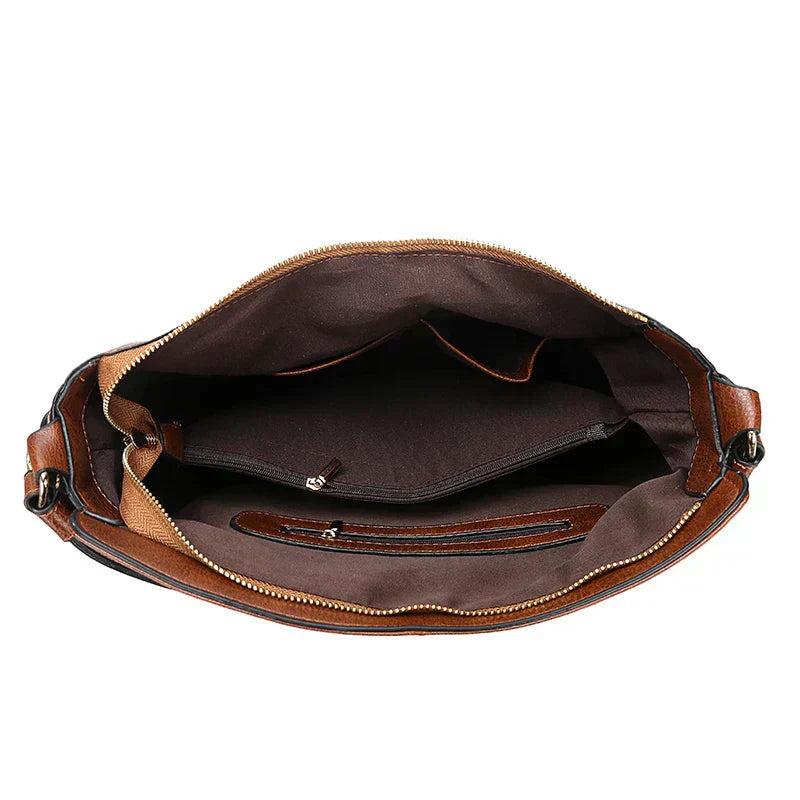 Bolso de hombro de piel Morgan de Vega Madrid, diseño clásico y elegante en color marrón para uso diario.