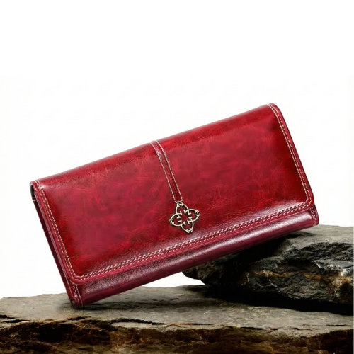 Cartera larga de piel Nicole de Vega Madrid, bolso femenino con diseño elegante y acabado en cuero negro.
