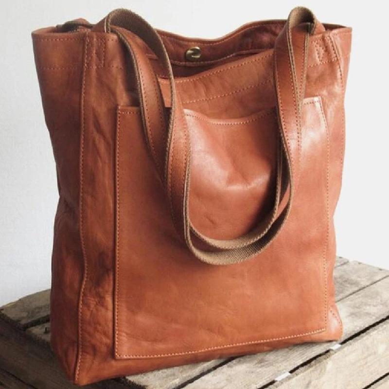 Bolso tote de piel Olivia de Vega Madrid, bolso clásico en cuero con asas y acabado elegante, en color natural.