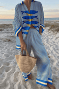 Conjunto de dos piezas Úrsula de Vega Madrid con camisa estampada y pantalón fluido en tonos suaves, estilo relajado y elegante.