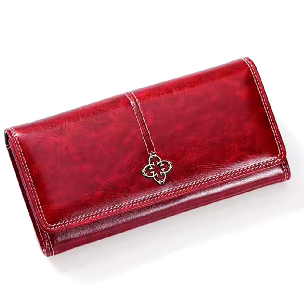 Cartera larga de piel Nicole de Vega Madrid, con diseño elegante y espacio para tarjetas y dinero en efectivo.
