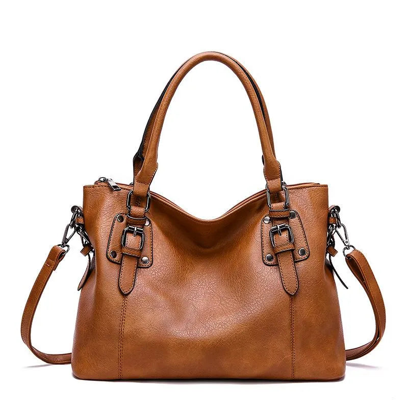 Bolso tote de piel Gabrielle de Vega Madrid, bolso de mano suave con asas y detalles elegantes en cuero natural.