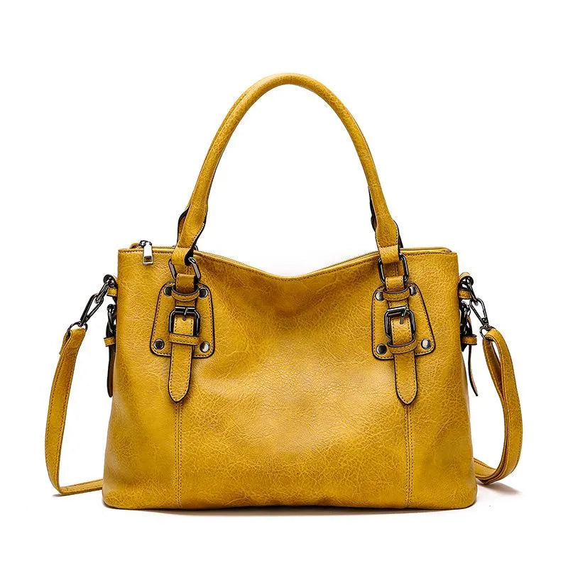 Bolso tote de piel Gabrielle de Vega Madrid, bolso de mano suave con asas y detalles elegantes en cuero natural.