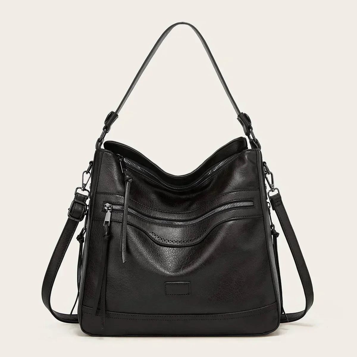 Bolso de hombro de piel Selena de Vega Madrid, diseño vintage en cuero con detalles elegantes y asas ajustables.