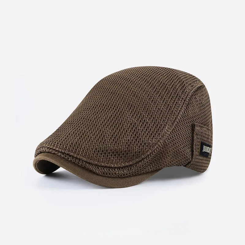 Gorra transpirable Vega Madrid Gael en color oscuro, con diseño deportivo y material ligero para comodidad y ventilación.