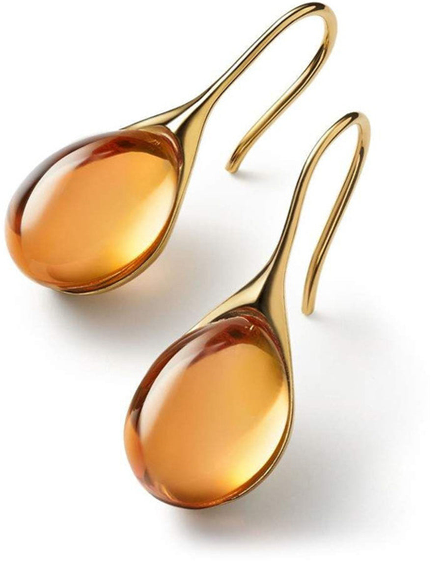 Pendientes colgantes dorados y plateados de Vega Madrid, diseño elegante con acabado brillante y detalles delicados.