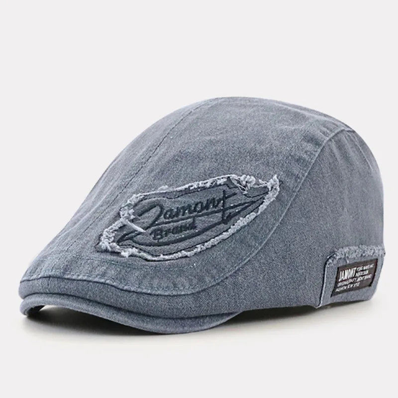 Gorra de denim Iván de Vega Madrid, estilo casual, con visera curva y bordado en el frente, en color azul.