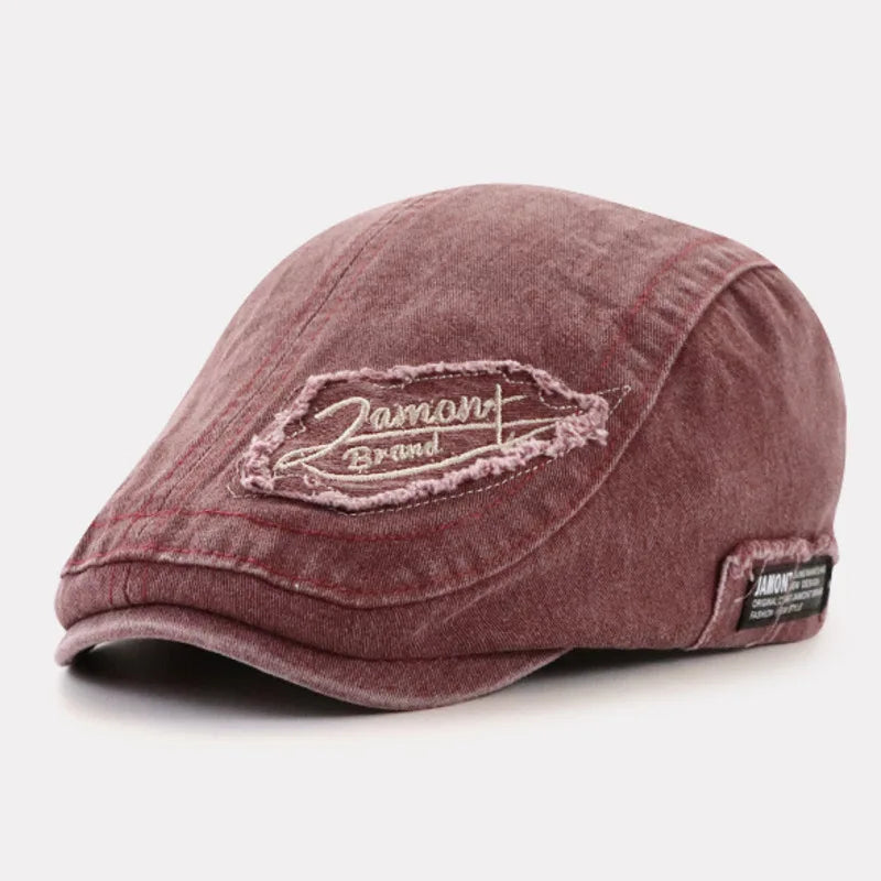 Gorra de denim Iván de Vega Madrid, estilo casual con diseño clásico y logotipo en la parte frontal.