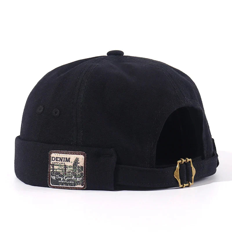 Gorra Docker vintage Iker de Vega Madrid, estilo clásico y resistente, en color oscuro con detalles vintage.