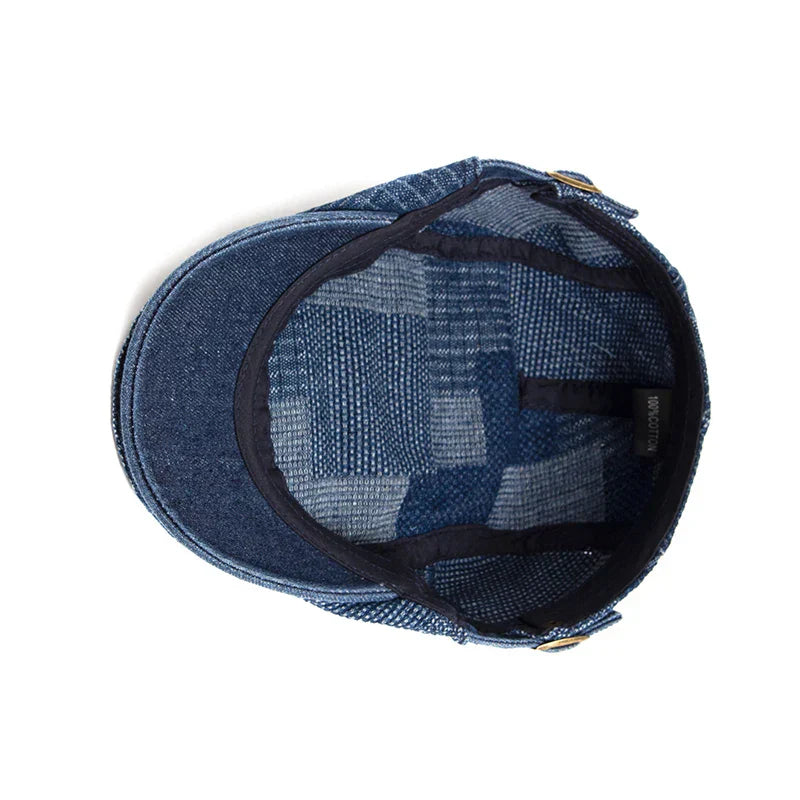 Gorra Capri de mezclilla Nico de Vega Madrid, estilo casual con diseño en denim y logotipo en la parte frontal.