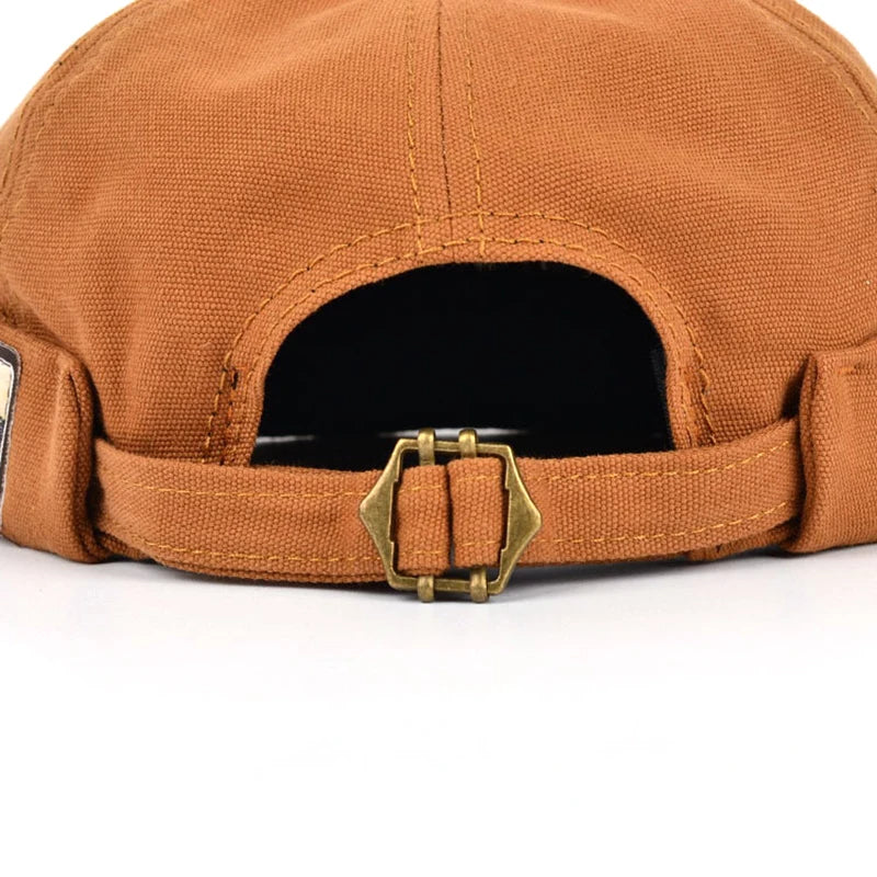 Gorra Docker vintage Iker de Vega Madrid, estilo clásico con logotipo en la parte frontal, en color oscuro y con diseño ajustado.