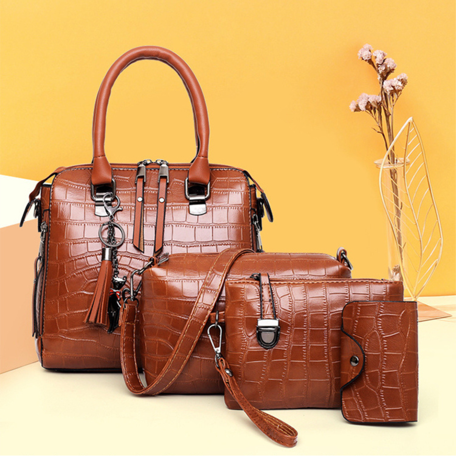 Conjunto completo 4 en 1 Natalie de Vega Madrid, incluye varias piezas de ropa, en colores neutros y diseño elegante.