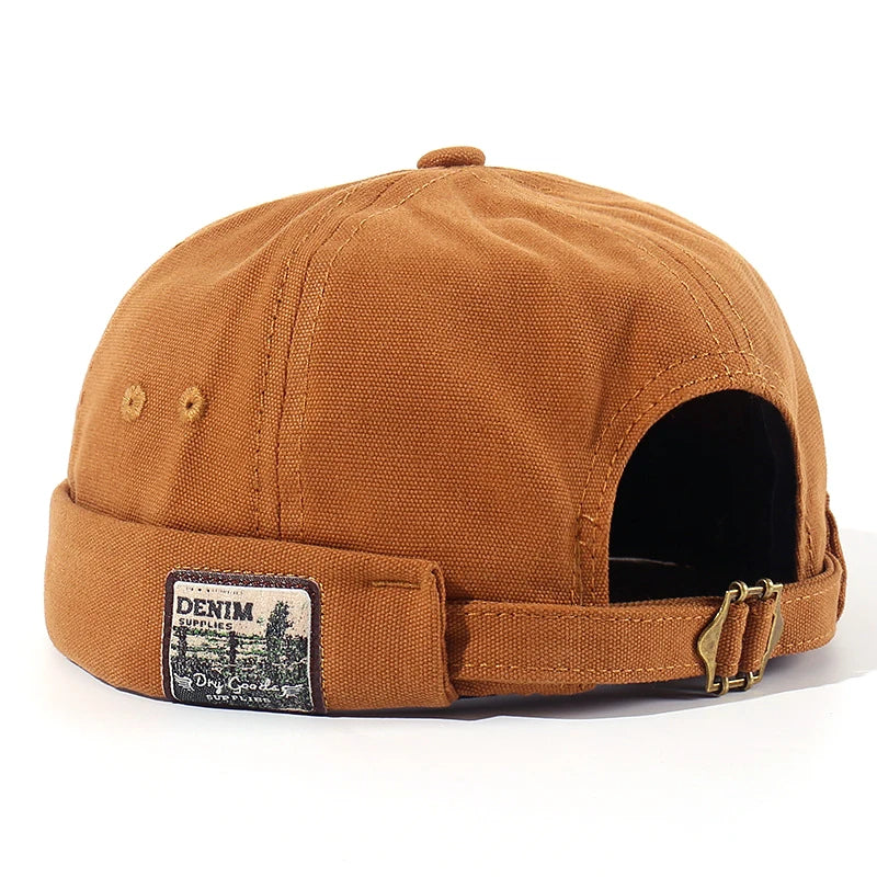 Gorra Docker Vintage Iker de Vega Madrid, estilo clásico, con diseño retro y logotipo en la parte frontal sobre tela de color neutro.