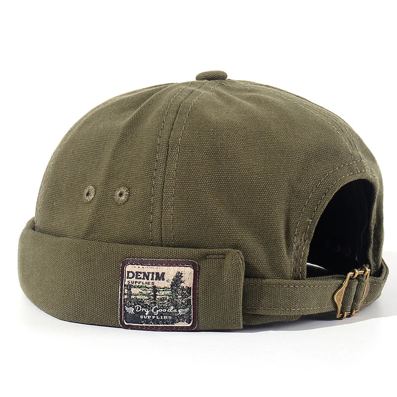 Gorra Docker vintage Iker de Vega Madrid, estilo clásico y casual, en colores neutros, vista frontal en fondo blanco.