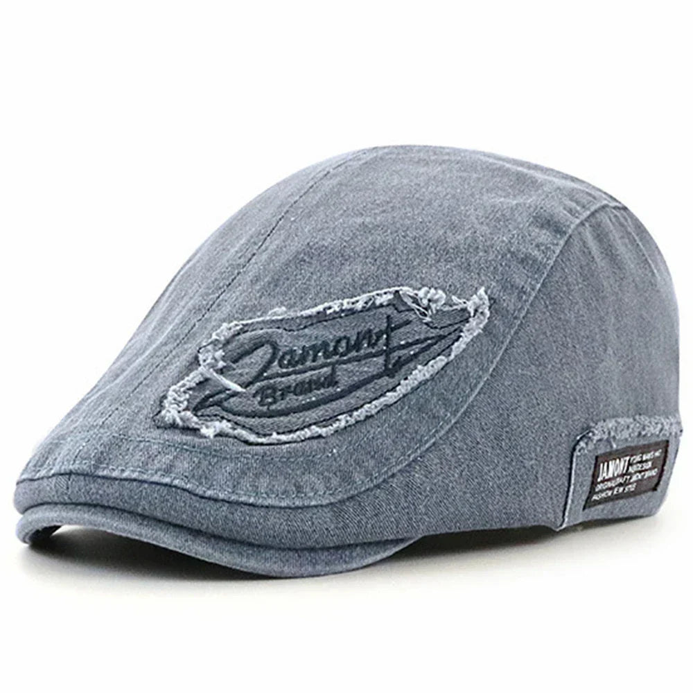 Gorra de mezclilla Iván de Vega Madrid, estilo casual, con visera curva y logotipo en la parte frontal, en color denim azul.