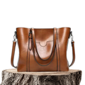 Bolso tote de piel Aubrey de Vega Madrid, bolso grande y elegante con asas robustas y acabado en cuero natural en color marrón.